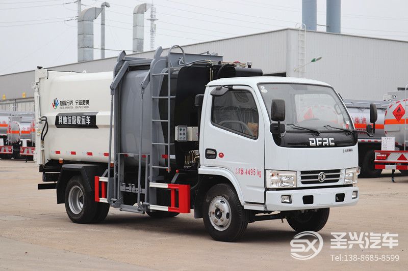 全新款東風多利卡側裝掛桶壓縮垃圾車